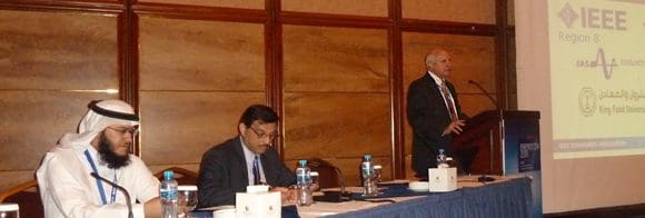 Seated left to right: SASO rep, Gahleb Dandan; EnergyCon Co-Chair, Chuck Adams; IEEE SA President and Keynote Speaker