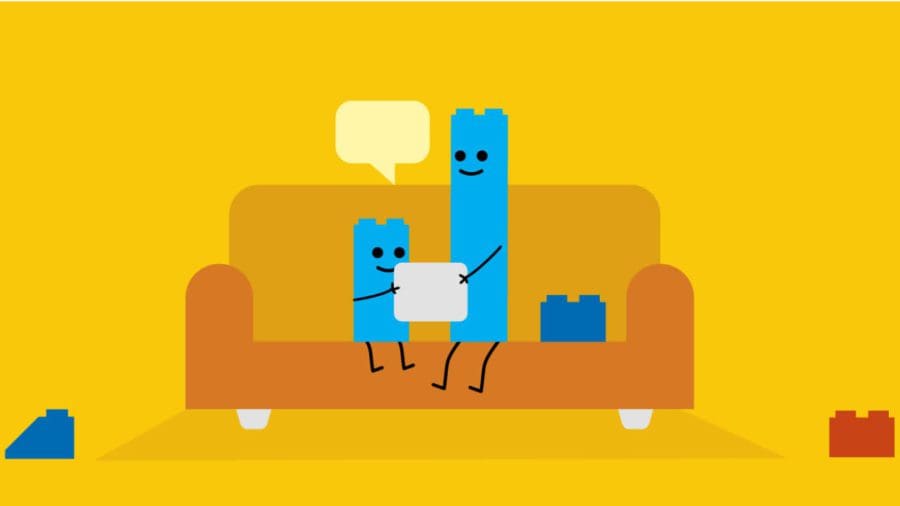 Cartoon of two anthropomorphic Lego blocks in a bright yellow living room. 