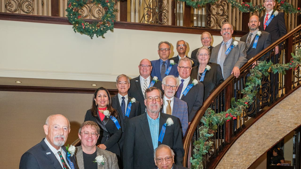 Recipients taking a group photo