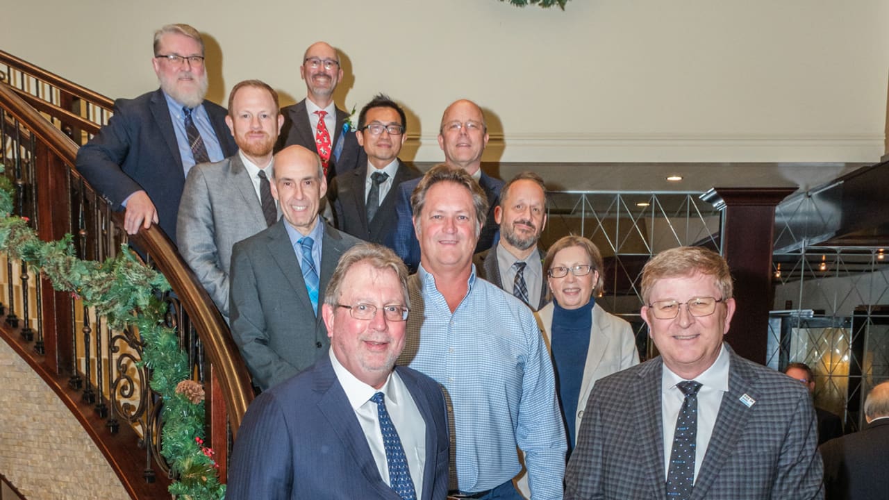 Recipients taking a group photo