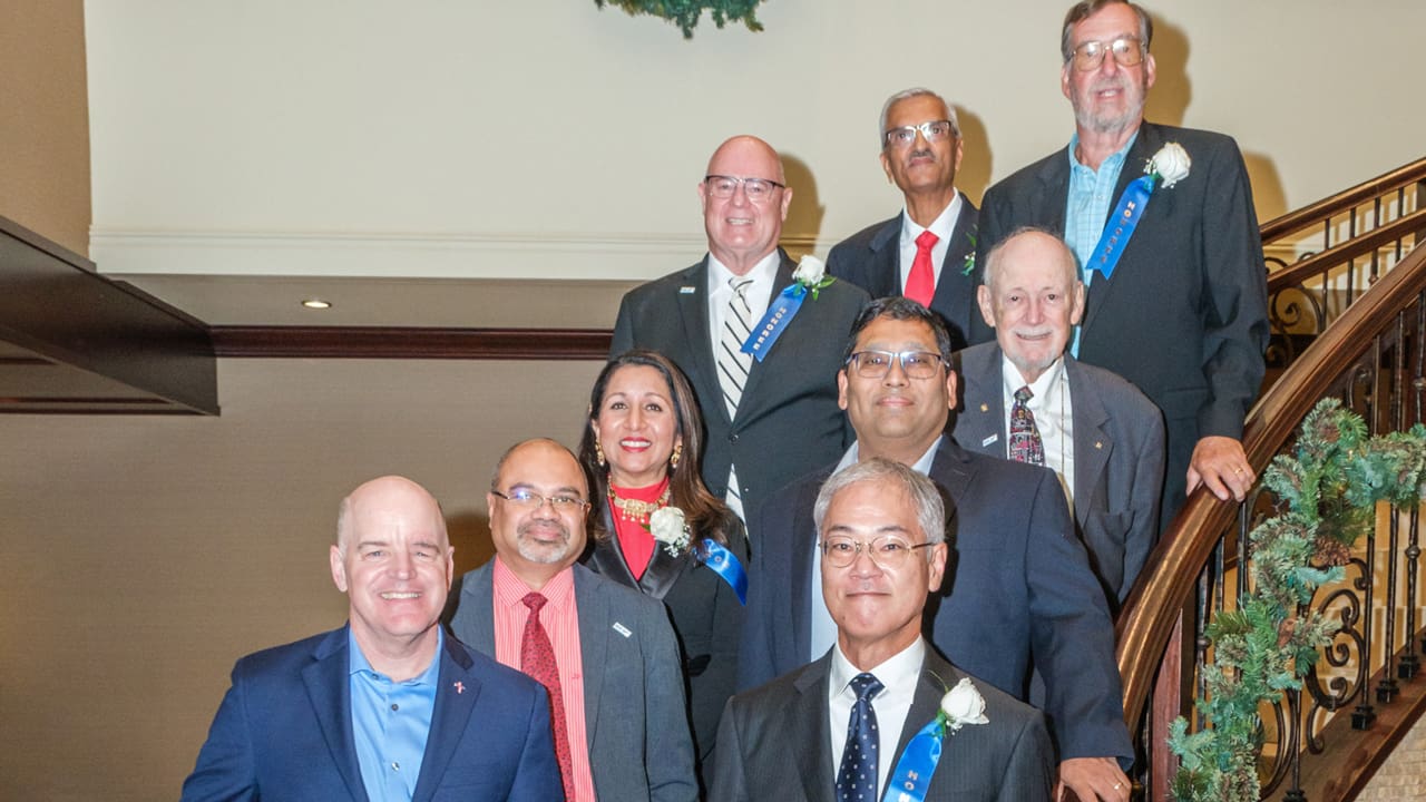 Recipients taking a group photo