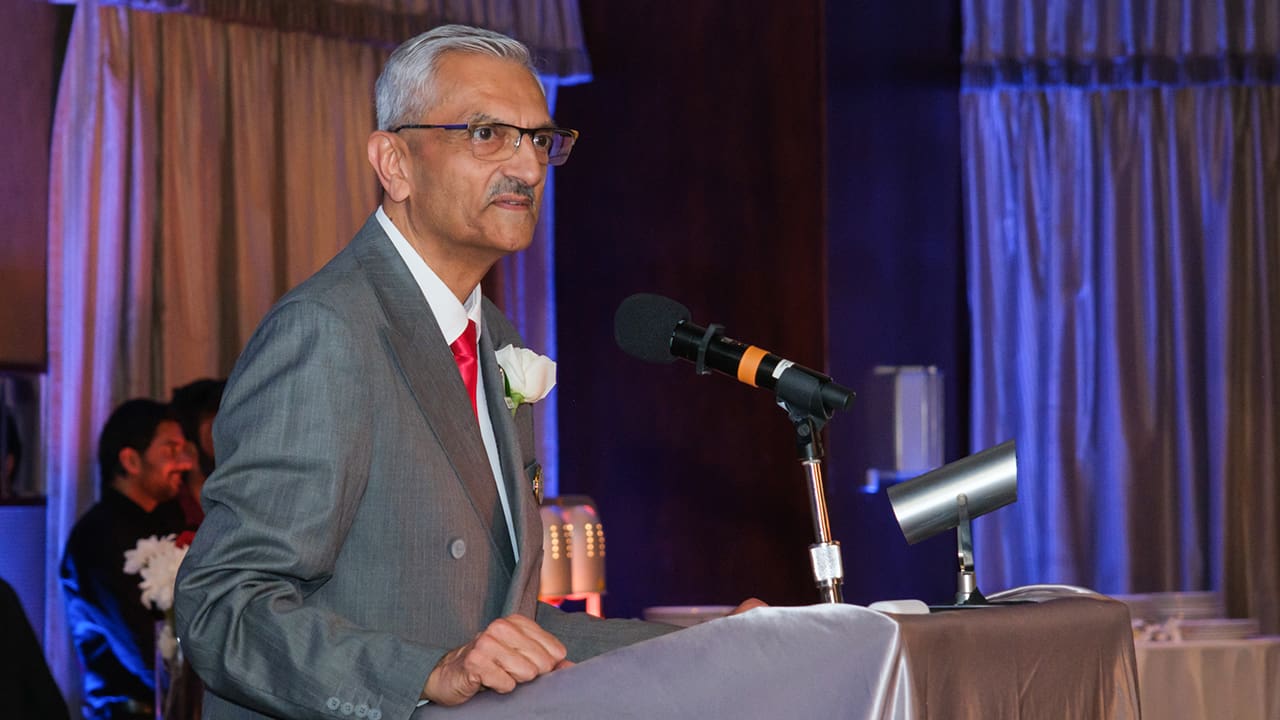 Yatin Trivedi making a speech.