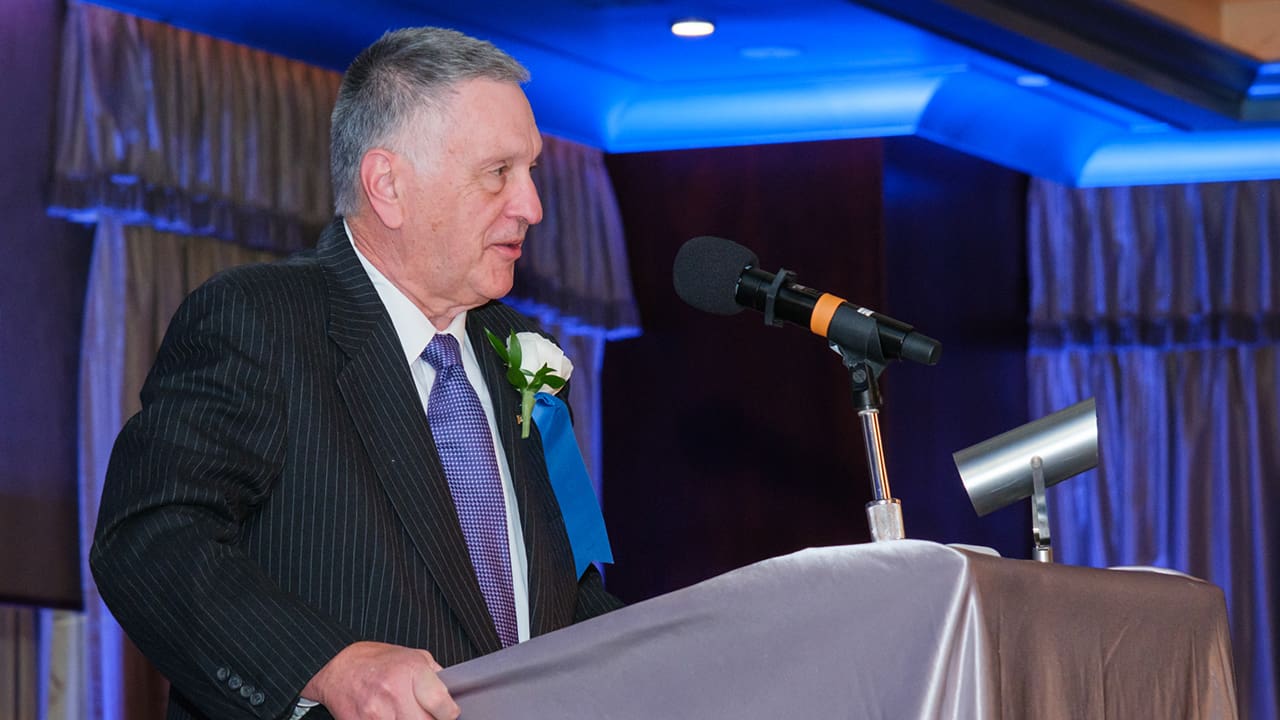 An IEEE SA Awards honoree making a speech.