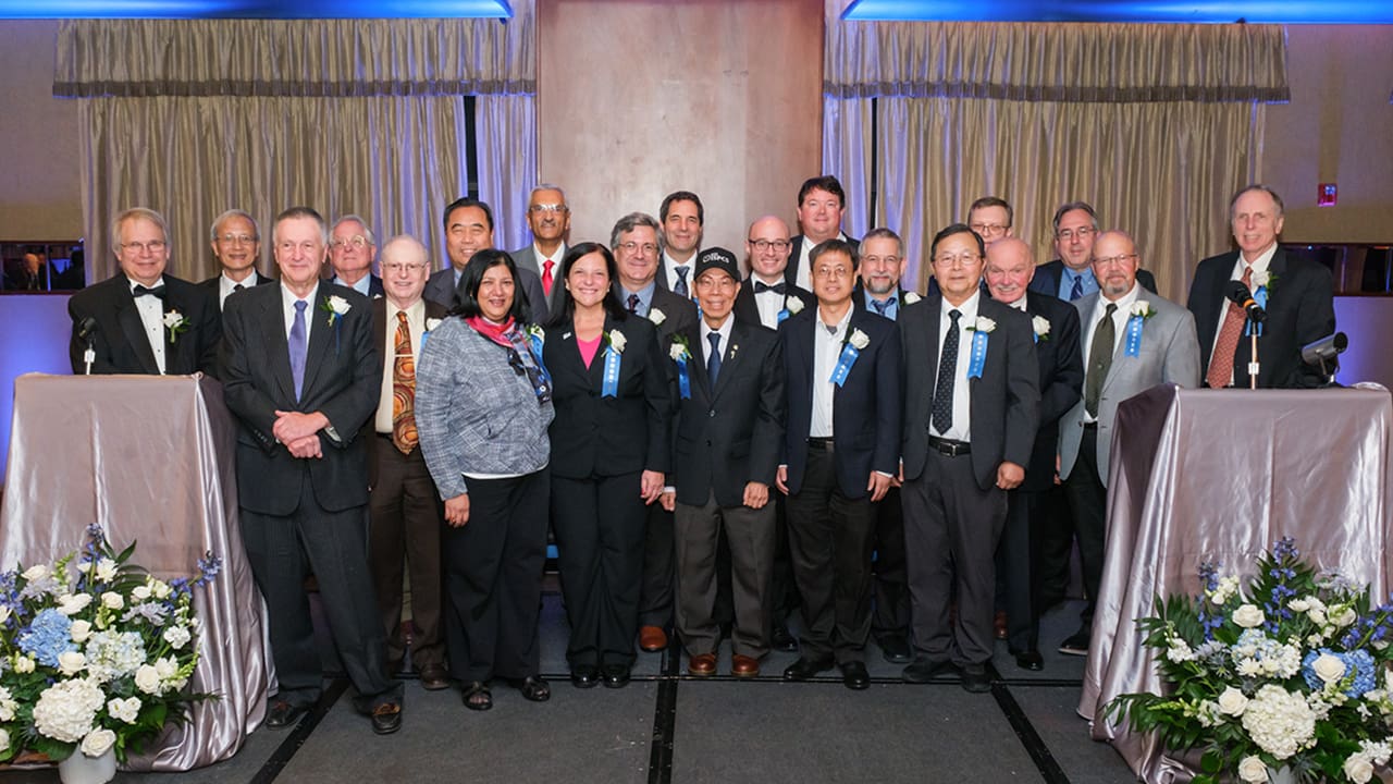 IEEE SA Awards honorees posing for a photo.