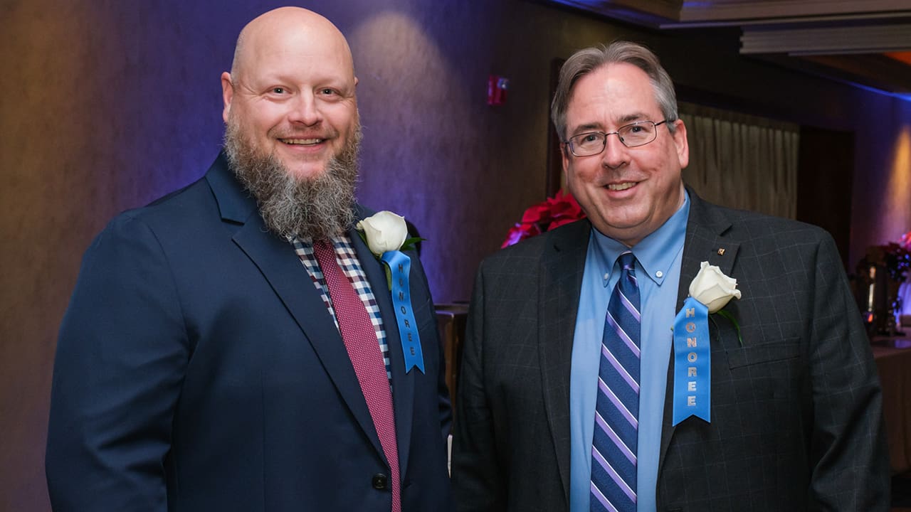 Two IEEE SA Awards honorees posing for a photo.